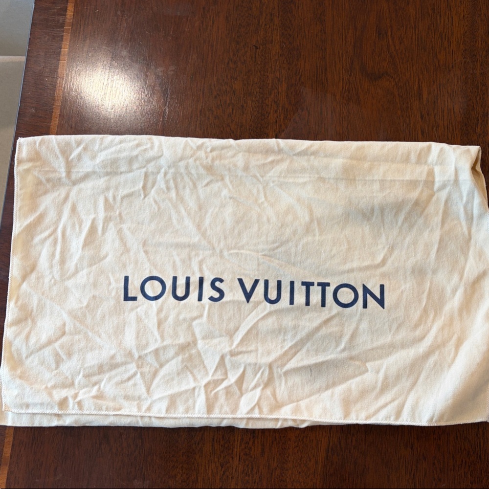 Louis Vuitton Cream Bag with Blue Logo
